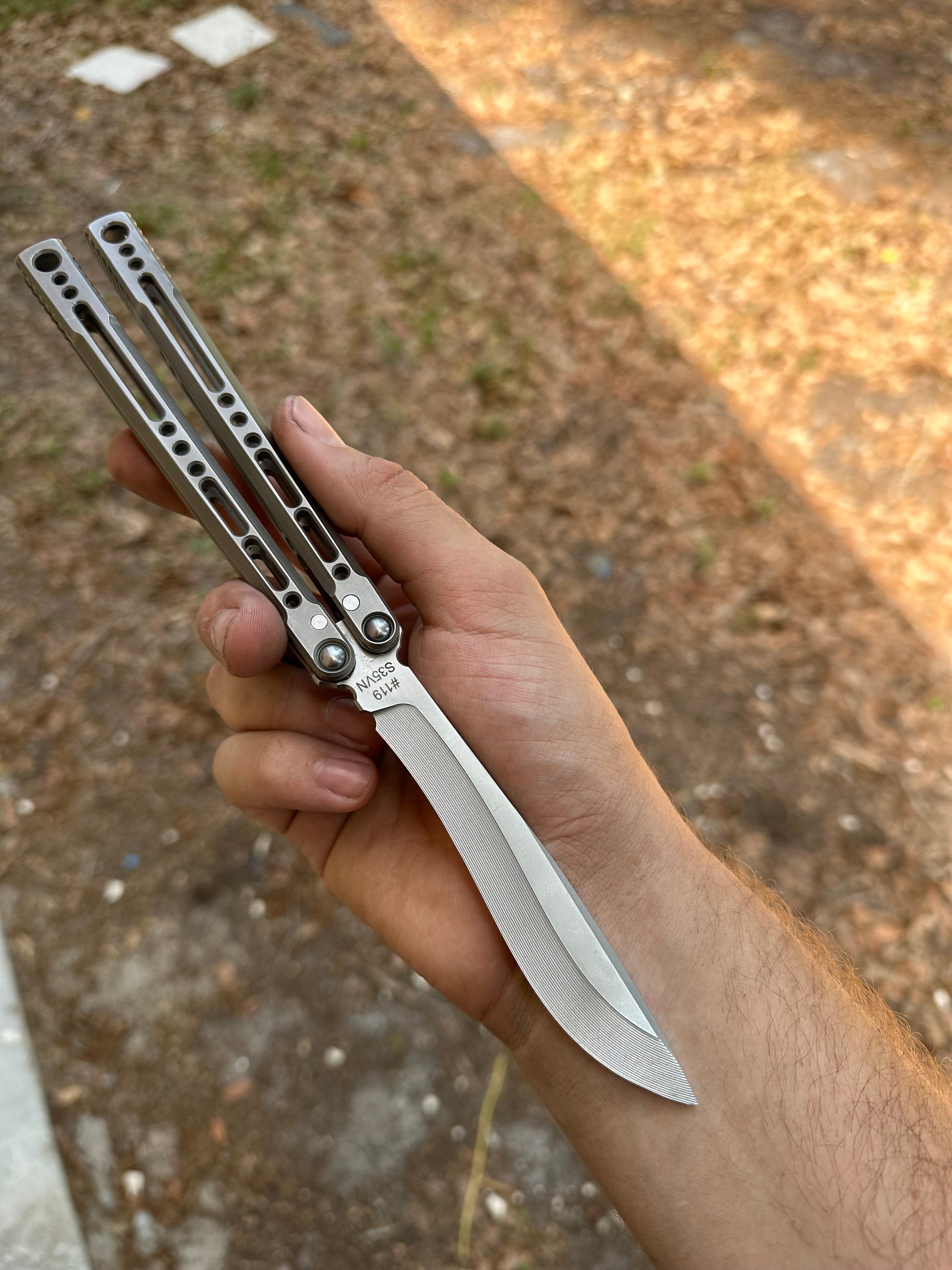 4 oz channel titanium balisong with bushing pivot